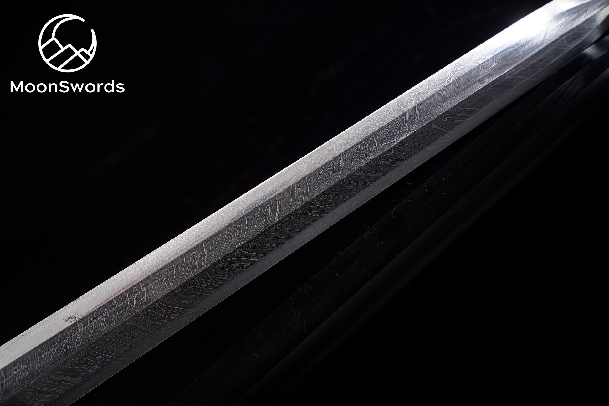 a sword with a black background and the words moon swords on it