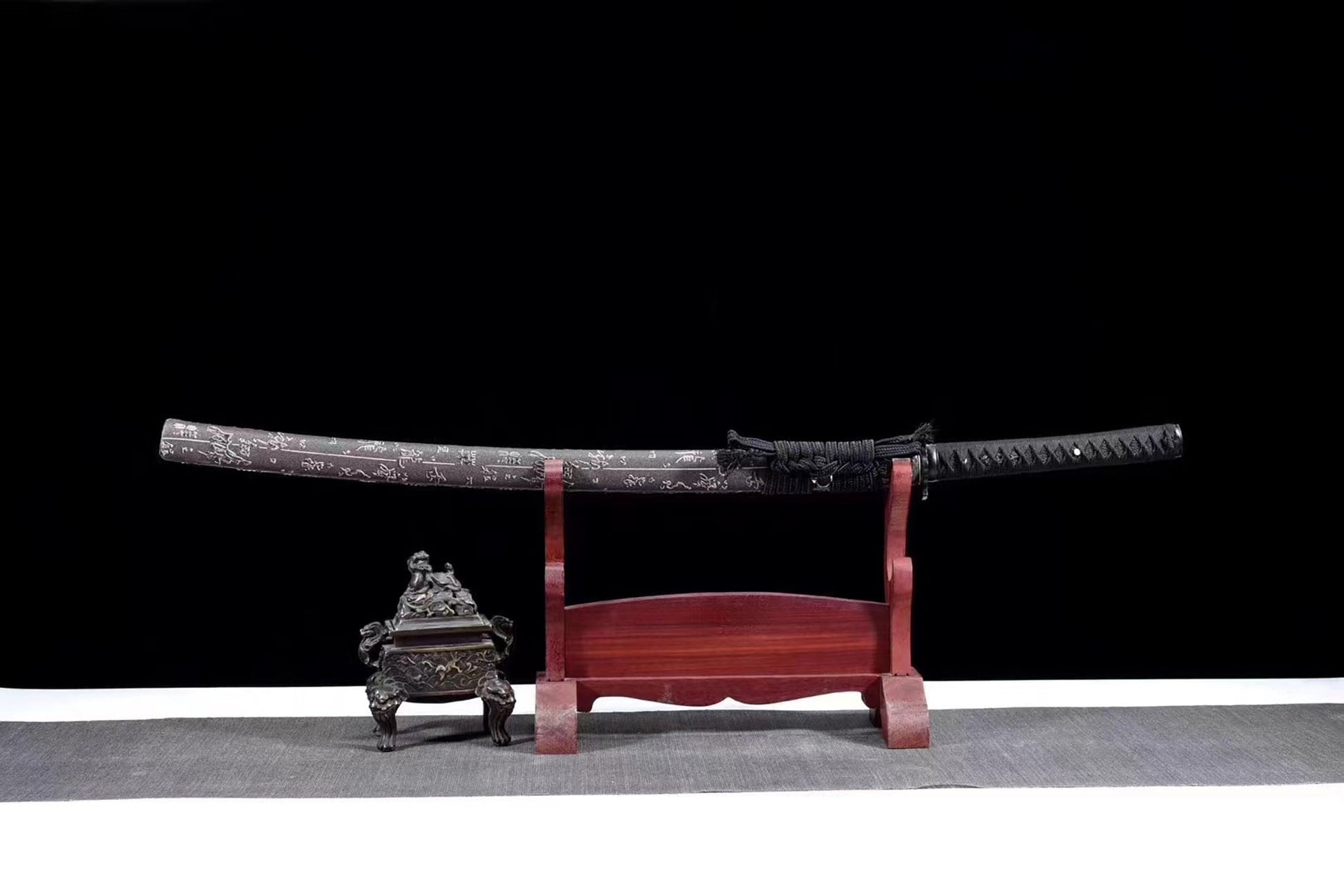 a wooden stand with a large sword on top of it