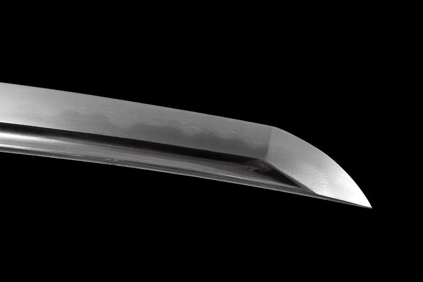 a large knife with a black background